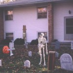 One of the skeletons standing the in yard